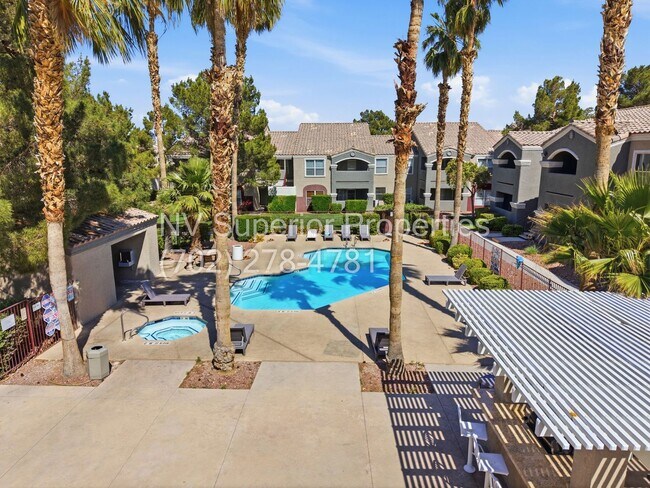 Building Photo - SW!! First floor unit with Balcony!! Gated!! Clubhouse!!  Community pool!! Spa!! Exercise Room!! ...