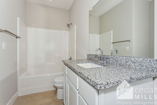 Building Photo - New Construction Across from McConnell! De...