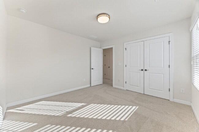 Building Photo - Classic finishes paired with an open, versatile layout!