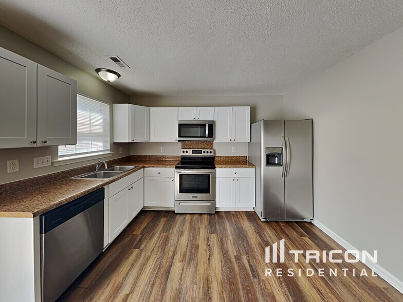 Building Photo - 9234 Tiger Lily Ln