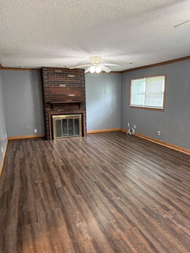 Building Photo - 3BR/1BA with overside detached garage read...