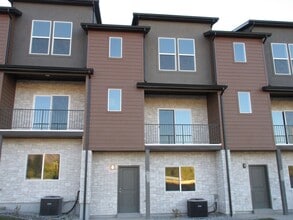 Building Photo - Going, Going... Almost Gone! One Brand New Townhome Left
