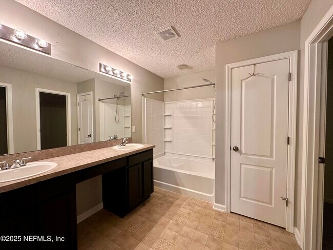 Building Photo - 6764 Gentle Oaks Dr