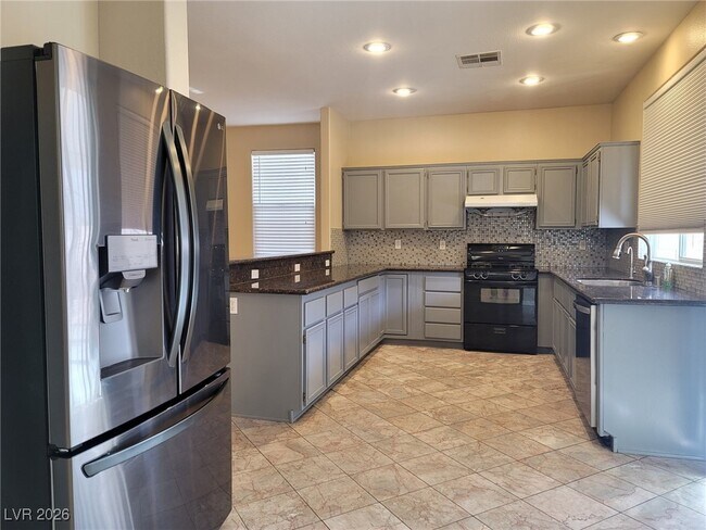 Building Photo - 9497 Rainfall Ave