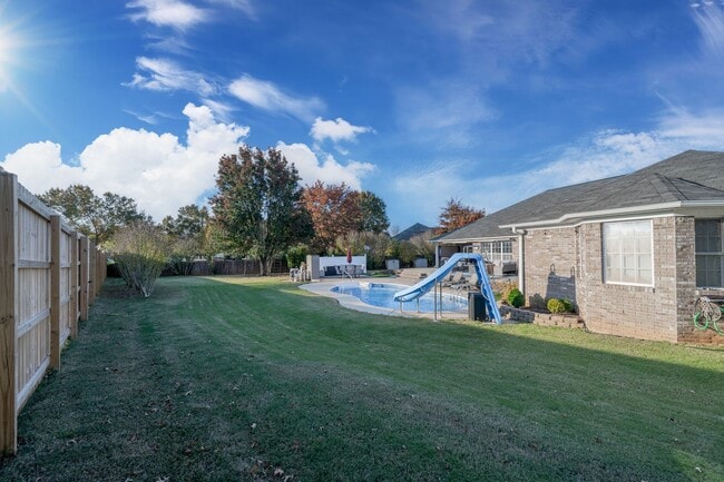 Building Photo - Spacious Madison Home with Pool, Game Room, Bonus Room & Prime Location