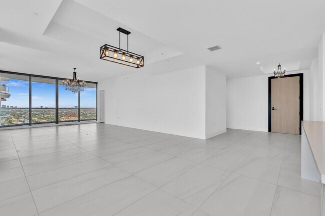 Building Photo - Stunning High-Rise Condo with Ocean Views | Prime Beach Location