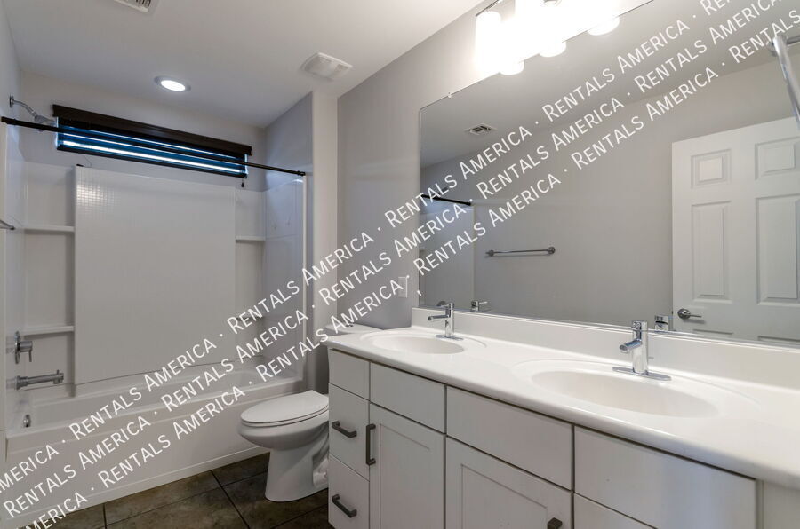 Building Photo - 5768 S Tiger Lily Pl