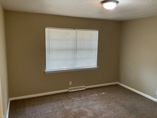 Building Photo - BACK ON THE MARKET!