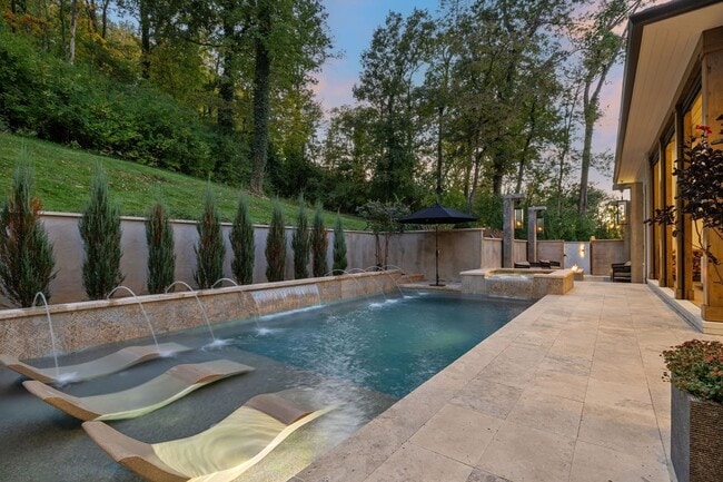 Building Photo - Experience elevated living in this fully furnished luxury residence