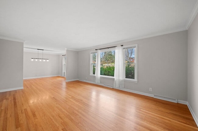 Building Photo - Spacious 4BR (or 3BR + Bonus) with 2 Living Rooms, Screened Porch & 4-Car Garage