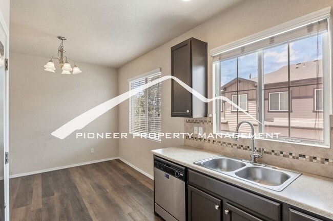 Building Photo - Low-Maintenance Living with Mountain Views! 3BR Townhome, 2-Car Garage & A/C