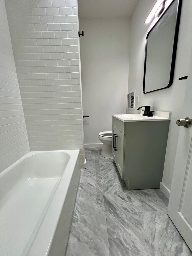 Building Photo - Newly Renovated 3-Bedroom Townhouse in Elmwood Park! Available mid-May! PHA VOUCHERS ACCEPTED!