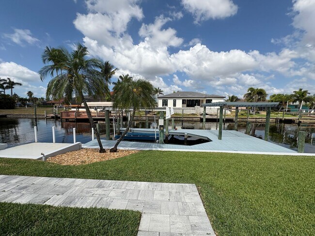 Building Photo - Beautifully Furnished Pool Home with Boat ...