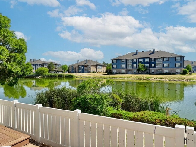 Building Photo - Lakeside 3 Bed/2.5 Bath Townhome in Gateway Community! Quiet, Scenic Living in The Heart Of Denver!