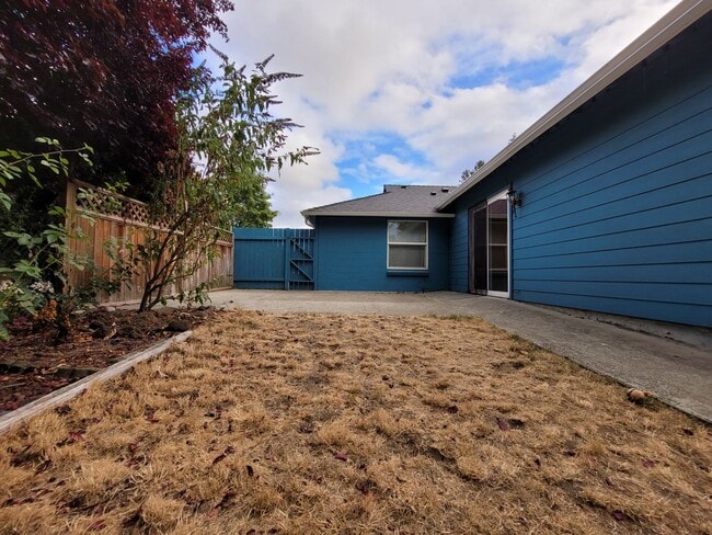 Building Photo - Bright Four-Bedroom Home with Spacious Outdoor Area