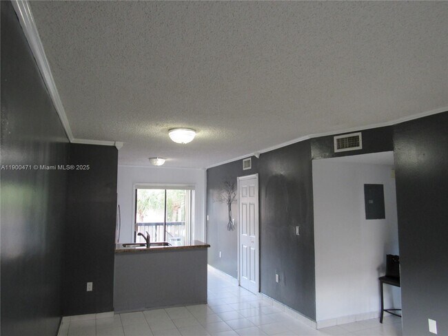 Building Photo - 5490 W 21st Ct