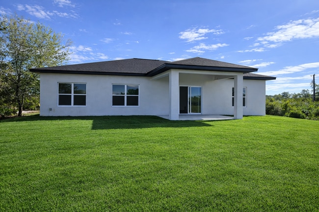 Building Photo - BRAND NEW Modern 4BR/2BA Home with Garage – Peaceful Lake Placid Retreat