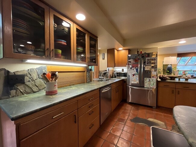 Building Photo - One-of-a-Kind Custom Home with Wall of Windows, Stone Fireplaces, Expansive Entertainment Space &...