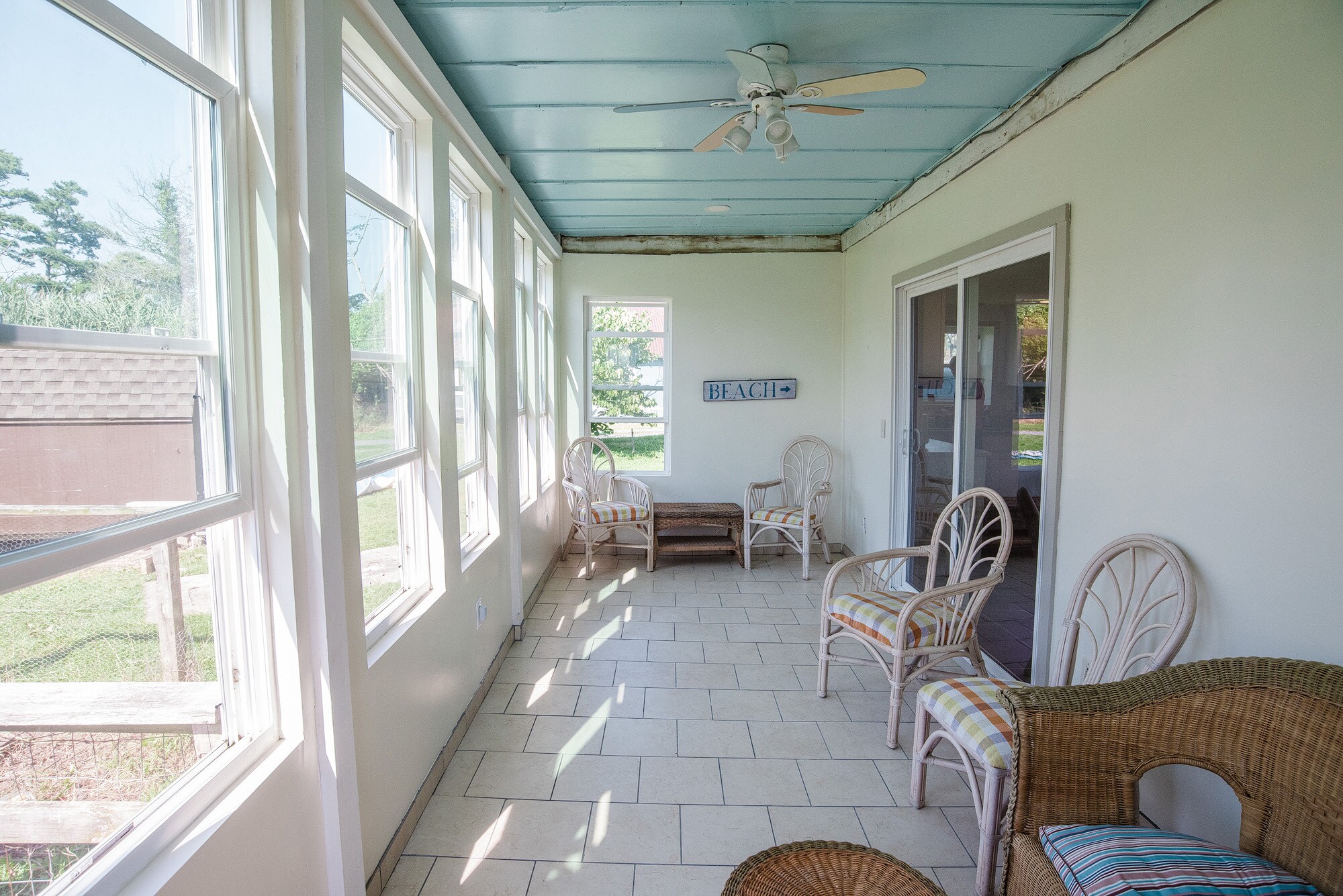 Sun room with air hockey table included - this is connected to the kitchen. - 5277 Main St