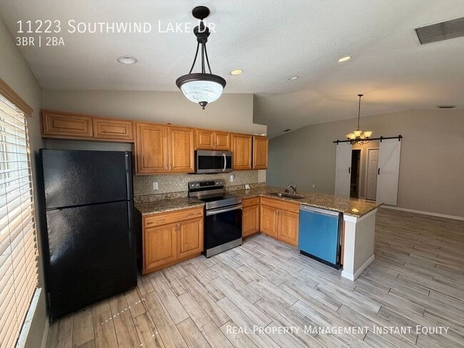 Building Photo - 11223 Southwind Lake Dr