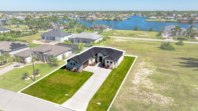 Building Photo - Brand-New Coastal Retreat | 4BR Home in NW Cape Coral