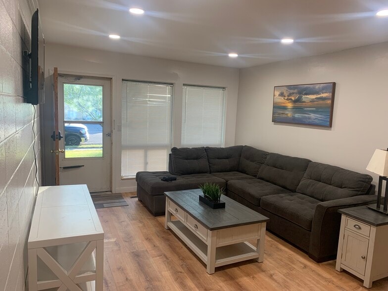 Living room /couch, television, console, coffee table, in table - 886 Raymond Dr