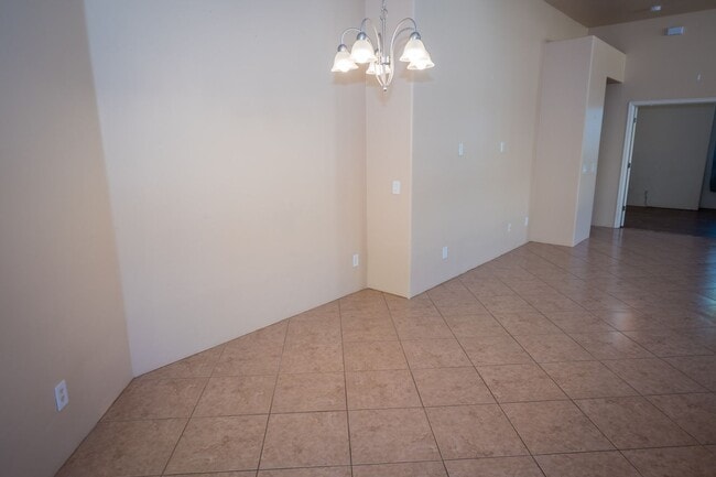 Building Photo - Gorgeous 3 Bedroom 2 Bathroom Home with Tile Throughout! Central A/C, 2 Car Garage!
