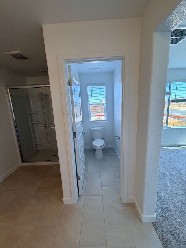 Building Photo - **Welcome to this beautifully designed 4-bedroom, 3-bathroom home offering modern living space.**