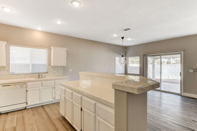 Building Photo - 1 Story in Summerlin - Fresh Carpet, Paint, and Luxury Plank!