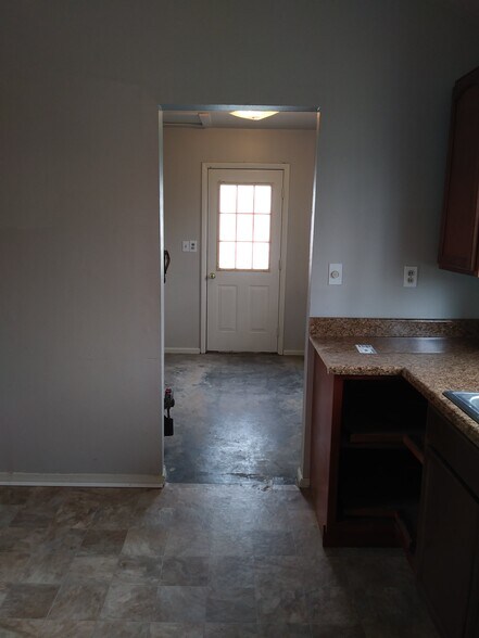 Kitchen adjacent to Laundry room and back door - 7005 John Adams Way