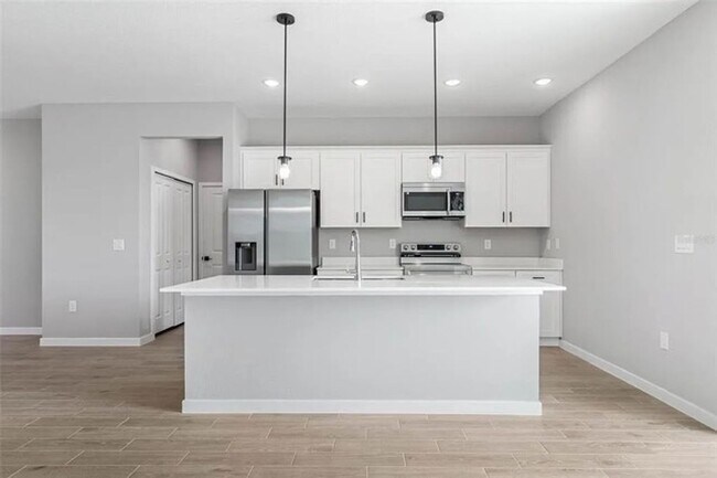 Building Photo - Brand New Townhome Overlooking the 15th Fairway