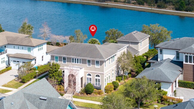 Building Photo - Luxury Waterfront Pool Home in Laureate Park | 4BR + Water Views