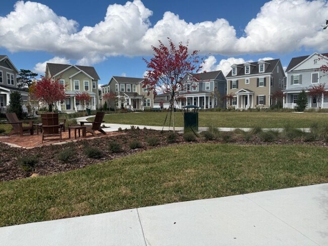 Building Photo - Brand new construction 3 Bedroom Town Home in Island Village of Celebration