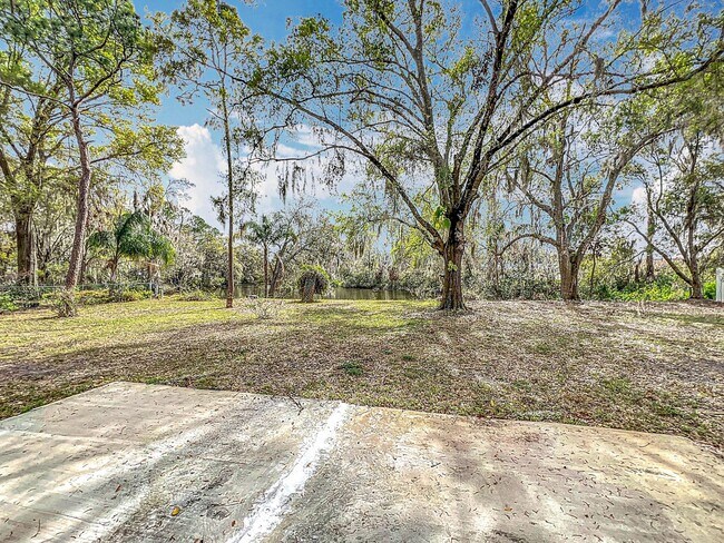 Building Photo - Stunning Waterfront Home located in the de...