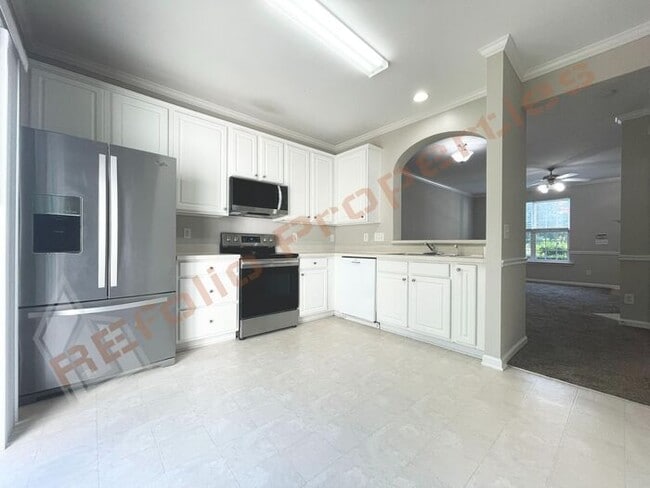 Building Photo - Fresh Paint Interior! Lovely 2 Bedroom 2.5...