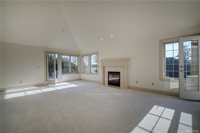 Building Photo - 8479 NE Woodland Cove Dr