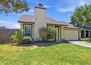 Building Photo - Corner-Lot Garden Home with a Private Patio.