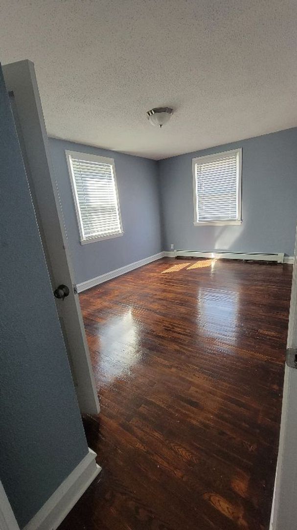 Building Photo - 7703 Woolston Ave