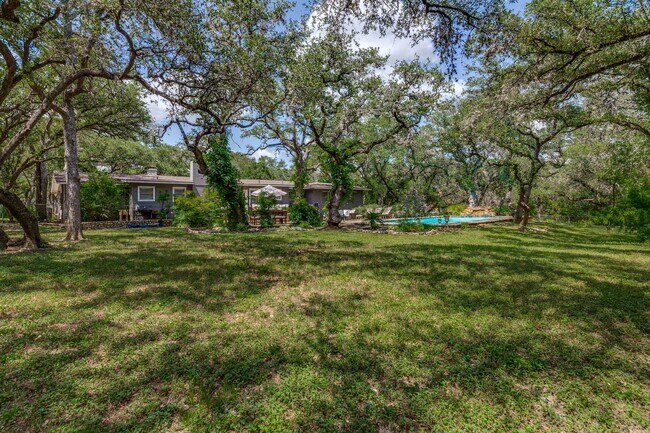 Building Photo - GORGEOUS RANCH-STYLE HOME ON WOODED 1.2 AC...