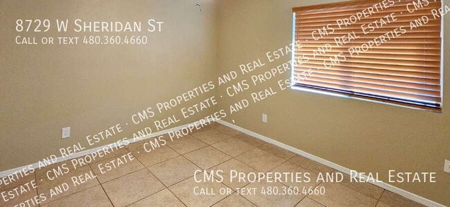 Building Photo - 8729 W Sheridan St