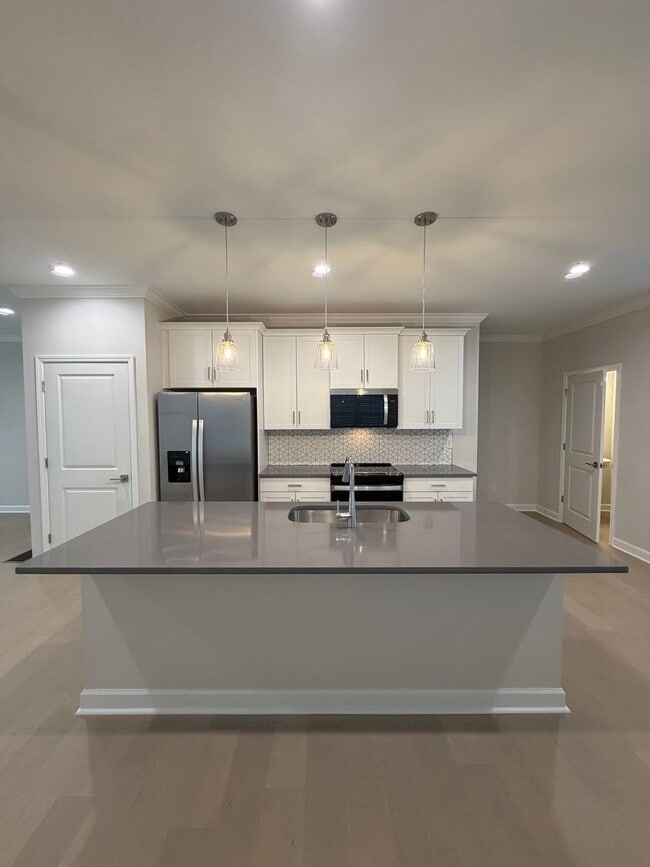 Building Photo - BRAND NEW TOWNHOMES AVALIABLE NOW