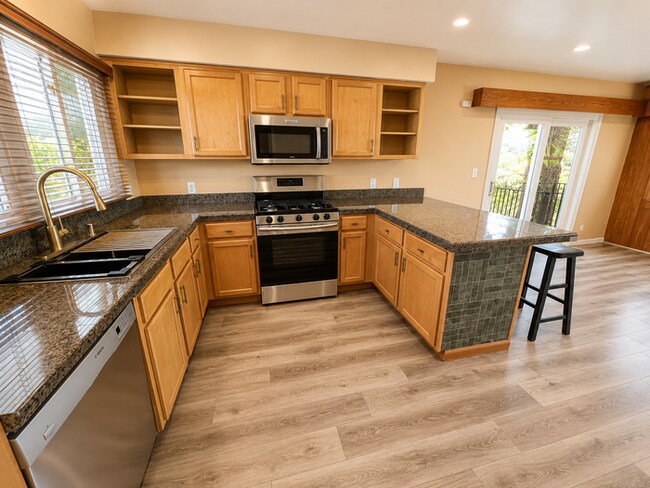 Building Photo - Stunning 3-Level Home with Canyon Views, Private Spa & Multiple Outdoor Living Spaces!