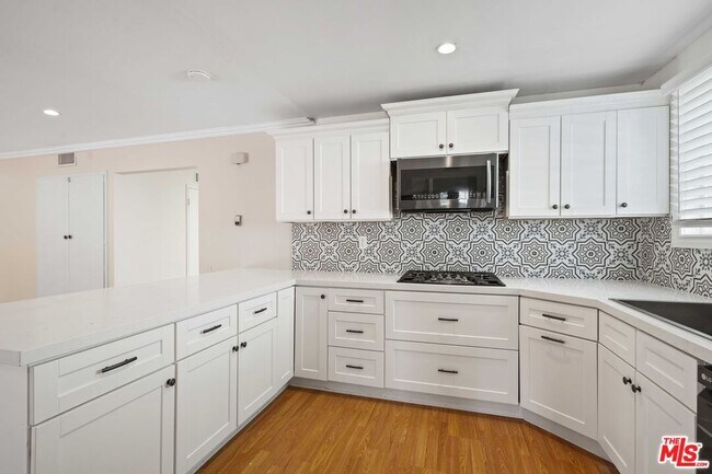 Building Photo - 6558 Neddy Ave