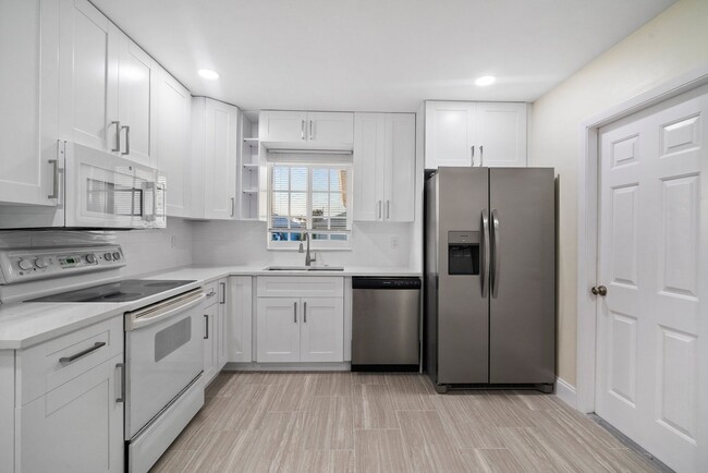 Building Photo - ANNUAL RENTAL - 2 Bedroom, 1 Bath w/ Garag...