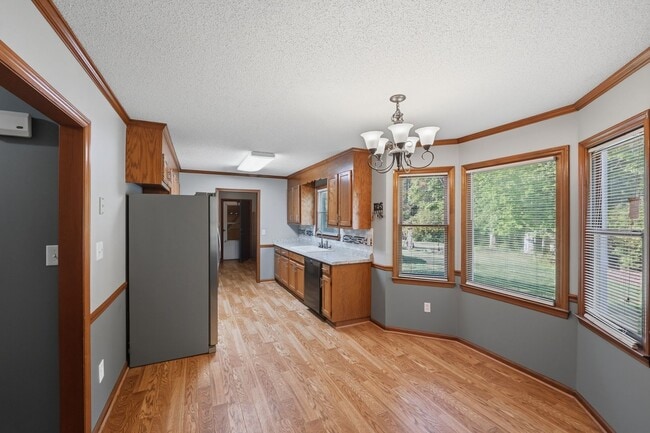 Building Photo - Spacious 4BR with Beautiful Backyard Retreat!