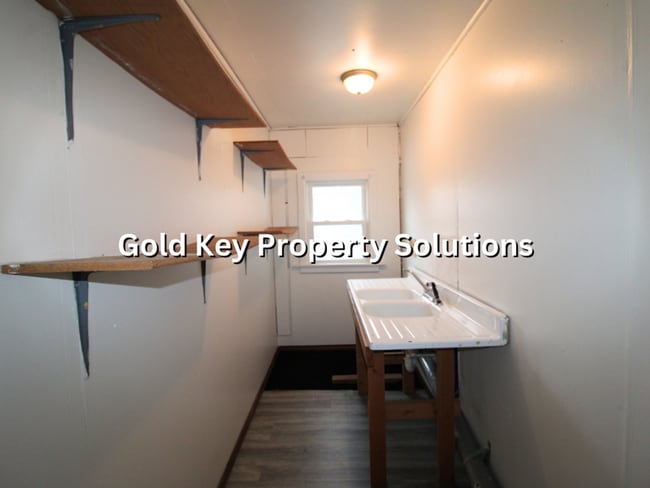 Building Photo - MUNCIE 2 BR 1 BA House with Covered Porch and Storage Building (NO SECTION 8)