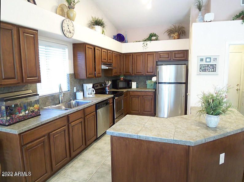 Step saving kitchen with stainless appliances. New Microwave coming 7/12 - 9139 W Davis Rd