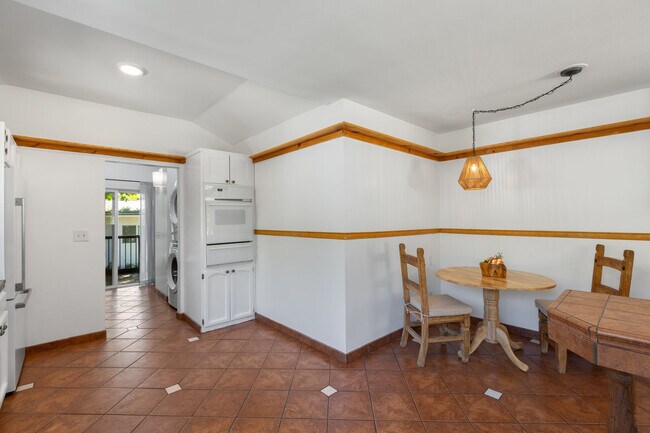 Oven area and breakfast area part of the kitchen - 228 N Pueblo Ave