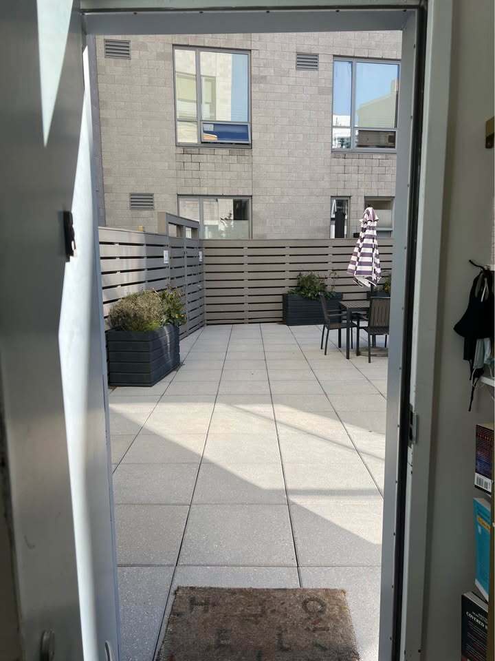 Apartment opens directly onto private, secure patio with direct access to Belmont + 14th street. - 1414 Belmont St NW