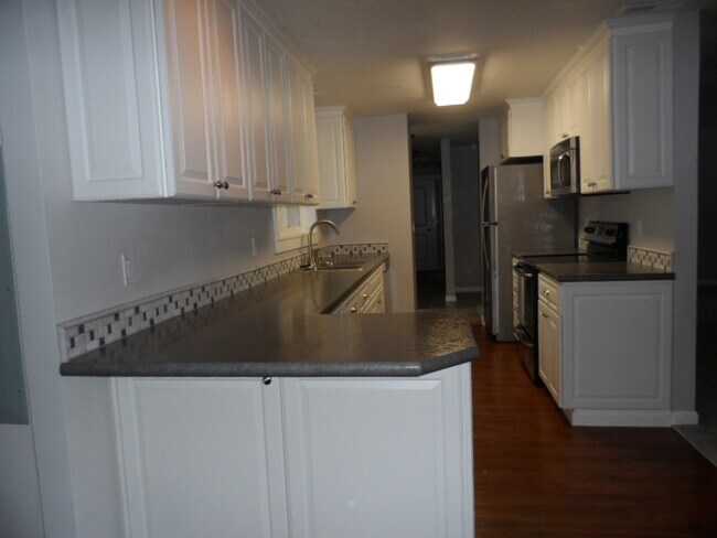 Building Photo - Inviting 3-Bedroom Home with Workshop/Storage and Outdoor Space